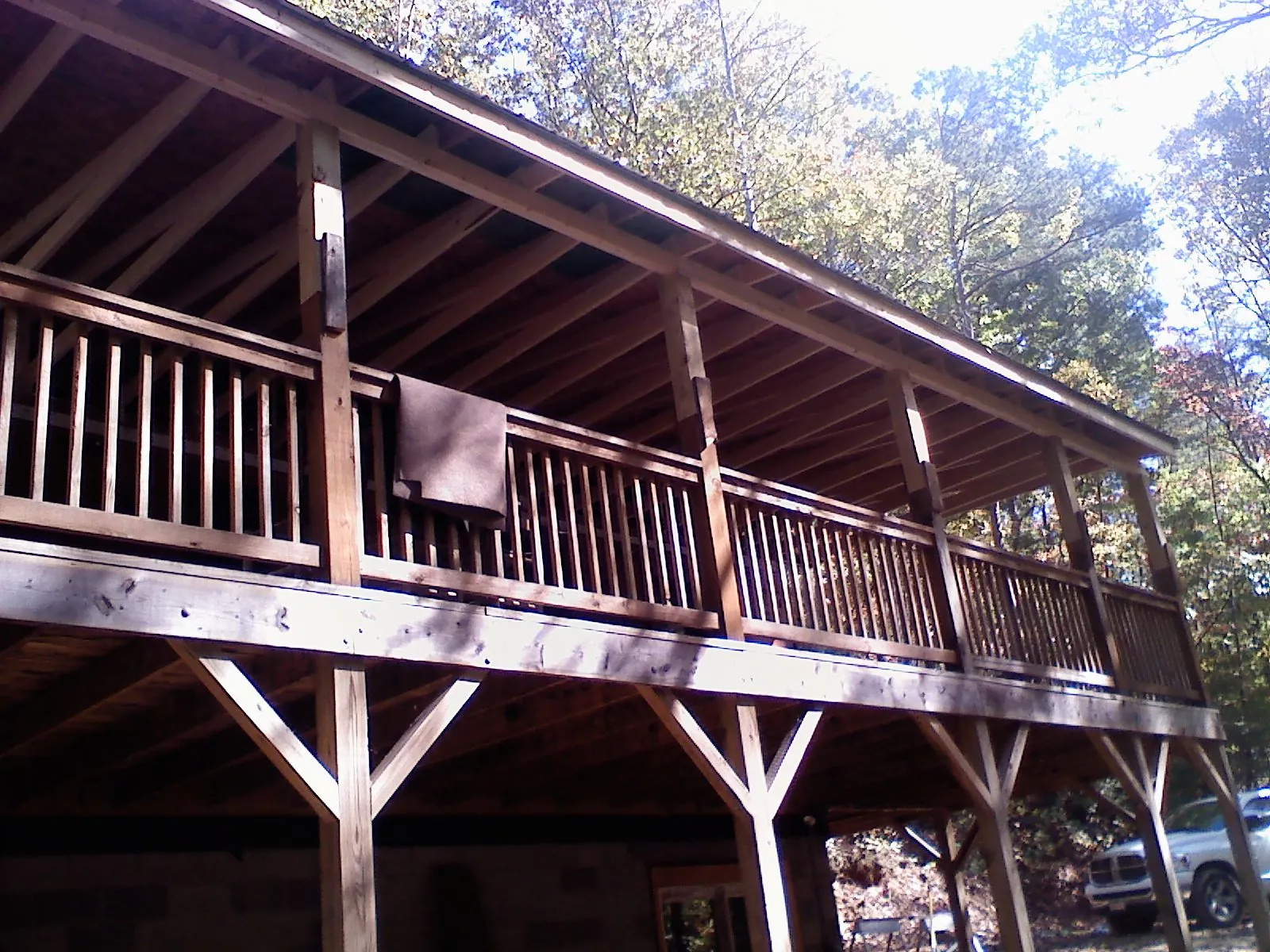 Timber framing under a new elevated porch and deck — Roof Leak Repair in Everest by Roofing Brothers